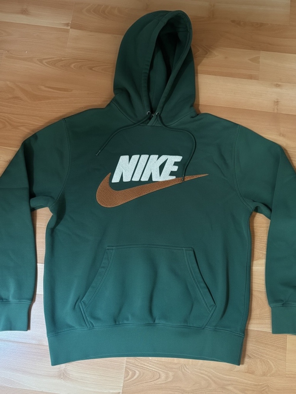 Nike Green Hoodie with White Logo and Brown Swoosh
